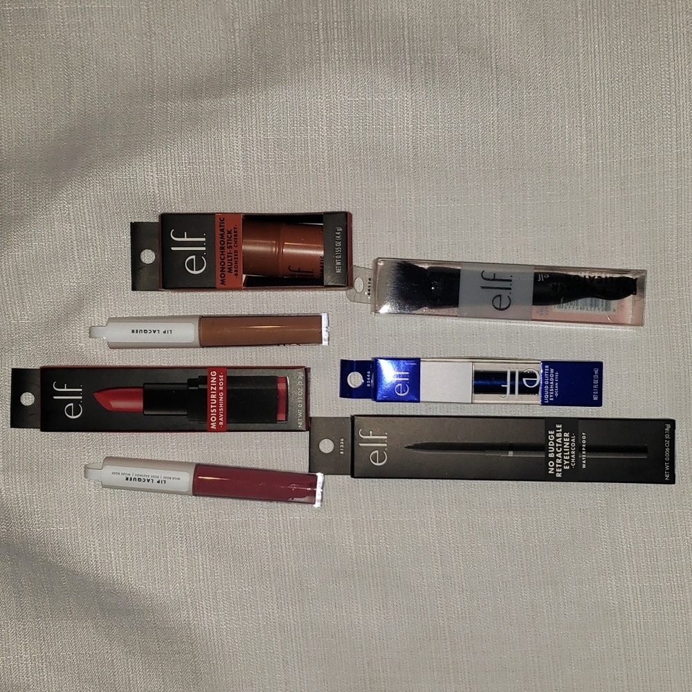 e.l.f. lipstick, lip lacquer,no budget retractable eye liner in charcoal....